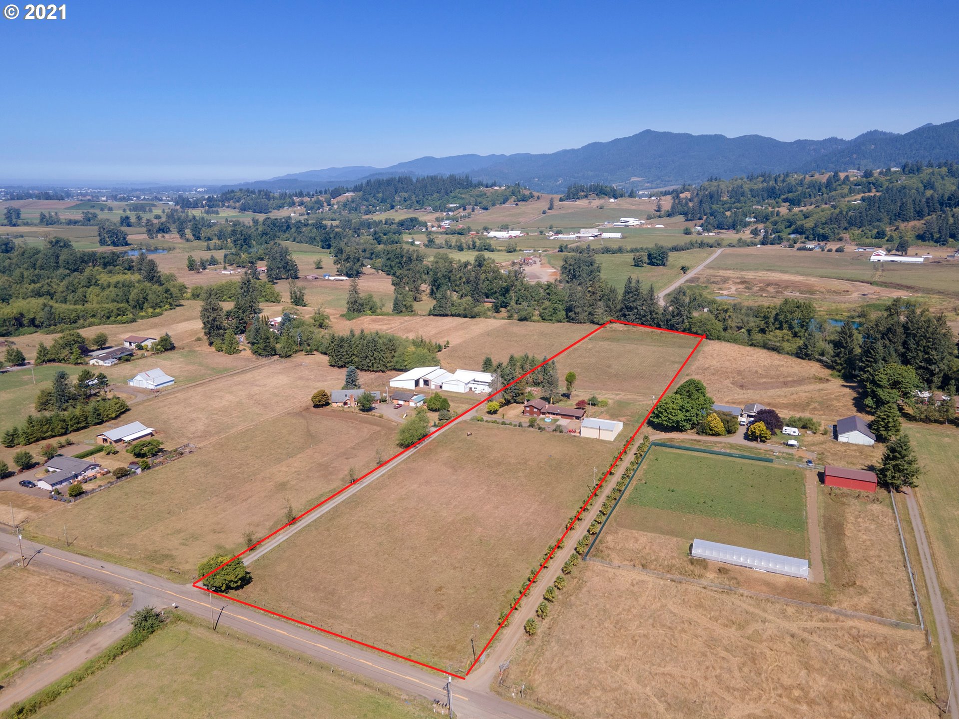 10050 Chance Road Tillamook, OR 97141 - Photo 5 of 31 an aerial view of a house with a garden