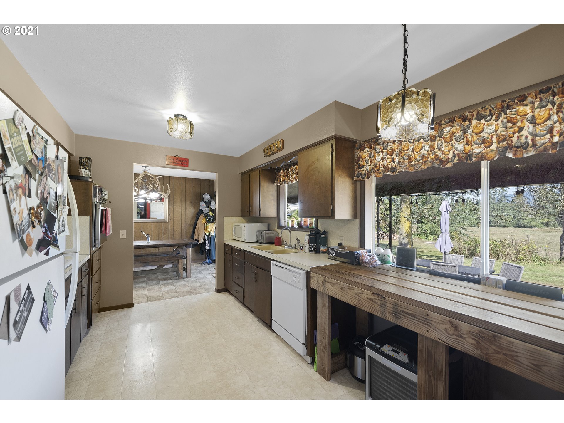 10050 Chance Road Tillamook, OR 97141 - Photo 10 of 31 a kitchen with lots of counter top space