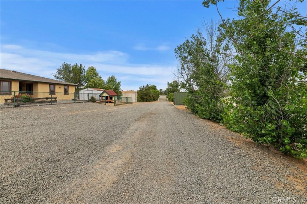 16420 Rocky Glen Road Perris, CA 92570 - Photo 53 of 74 a view of a road with a building in the background