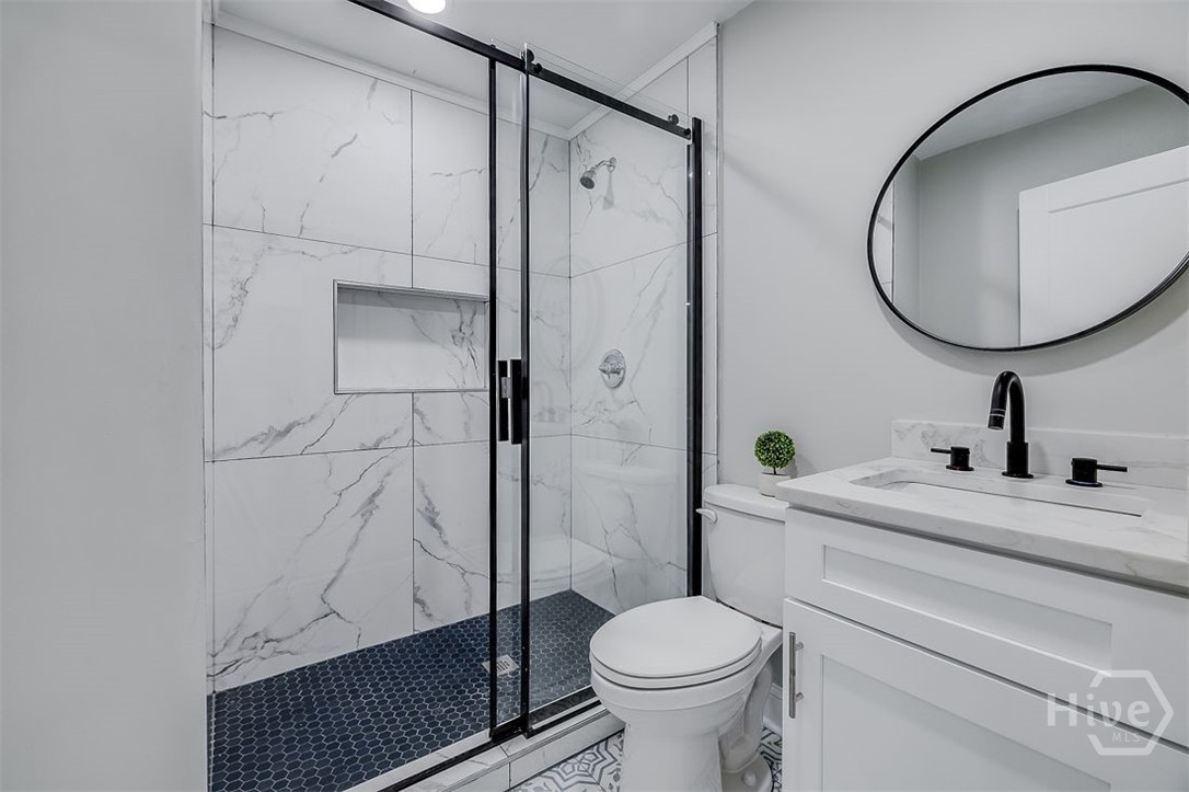 318 East 45th Street, Unit STUDIO Savannah, GA 31405 - Photo 17 of 20 Beautifully renovated main bathroom.