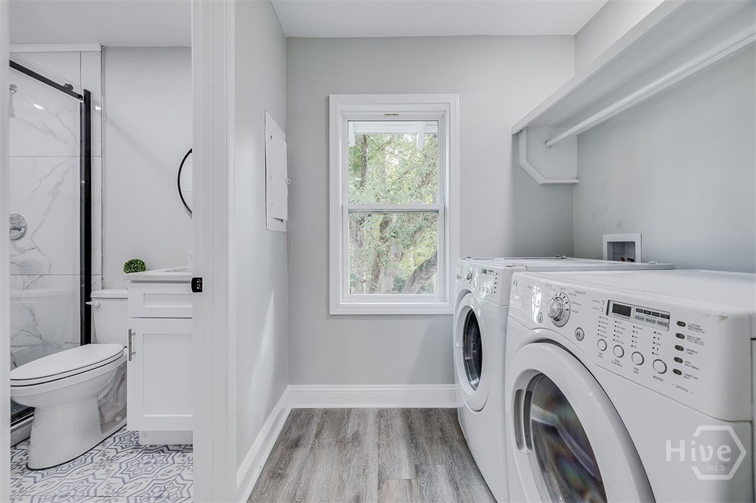 318 East 45th Street, Unit STUDIO Savannah, GA 31405 - Photo 18 of 20 Laundry area furnished with the washer and dryer.