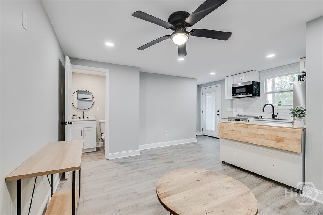 318 East 45th Street, Unit STUDIO Savannah, GA 31405 - Photo 5 of 20 Bright and inviting living area.