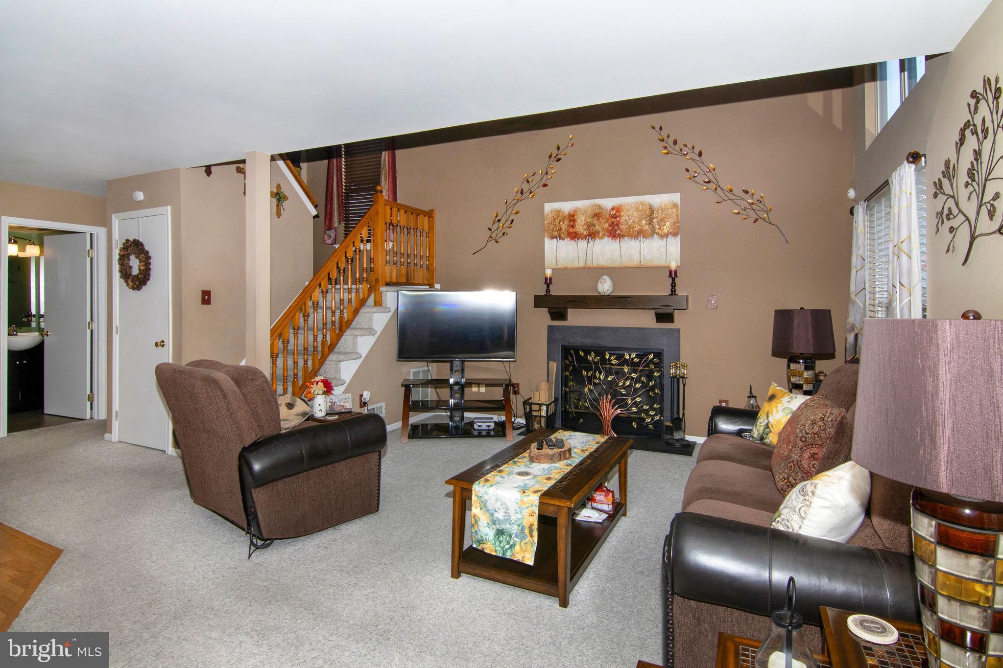 45 Wiltons Landing Road Sicklerville, NJ 08081 - Photo 19 of 48 Family Room: Fireplace and Stairs