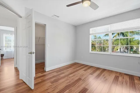 a room with flowers and a potted plant