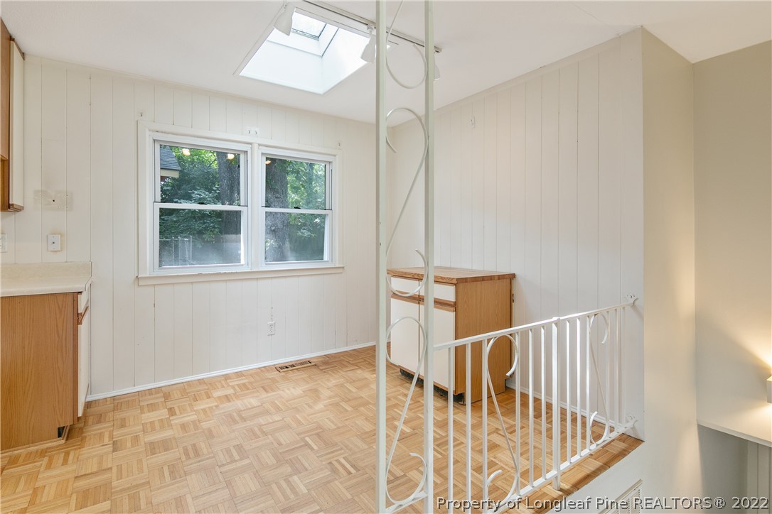 6309 Greyfield Road Fayetteville, NC 28303 - Photo 12 of 45 a view of staircase with white walls and window