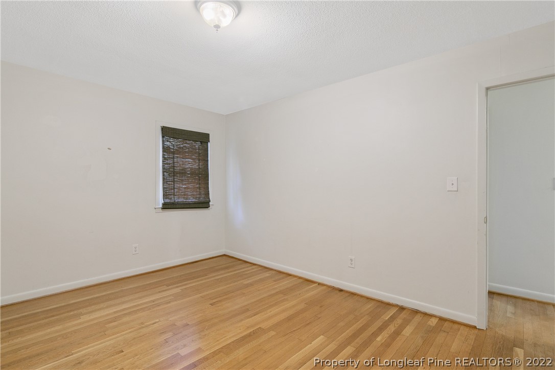 6309 Greyfield Road Fayetteville, NC 28303 - Photo 21 of 45 a view of a room with wooden floor