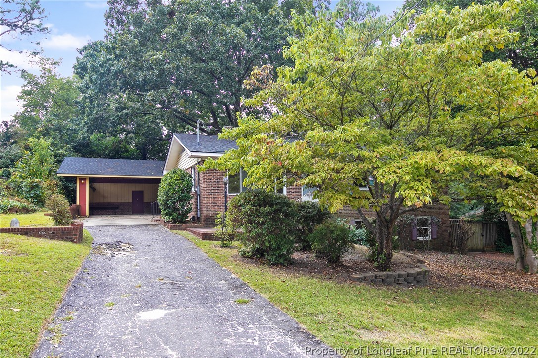 6309 Greyfield Road Fayetteville, NC 28303 - Photo 3 of 45 a front view of a house with garden