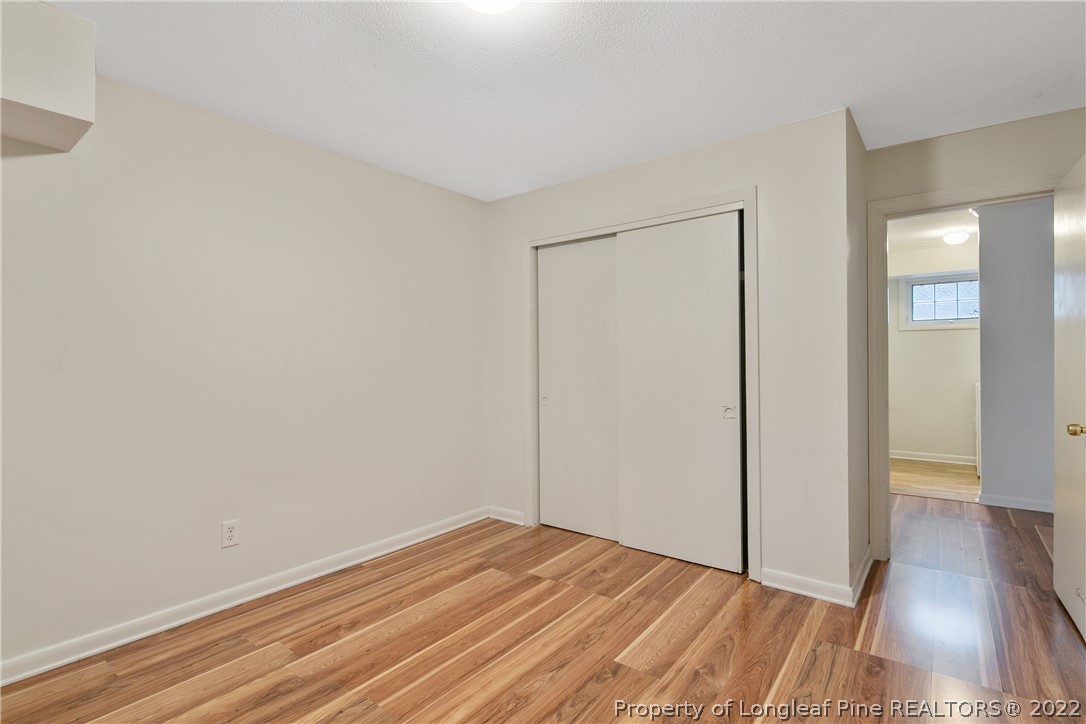 6309 Greyfield Road Fayetteville, NC 28303 - Photo 38 of 45 a view of empty room with wooden floor
