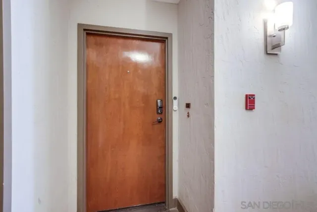 a view of an swimming pool with a seating space