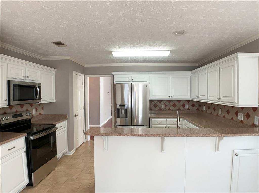 4306 Foxberry Run Loganville, GA 30052 - Photo 8 of 20