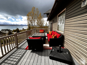 1940 East Shore Road St. Charles, ID 83272 - Photo 47 of 64 Wooden deck featuring outdoor furniture and a water view