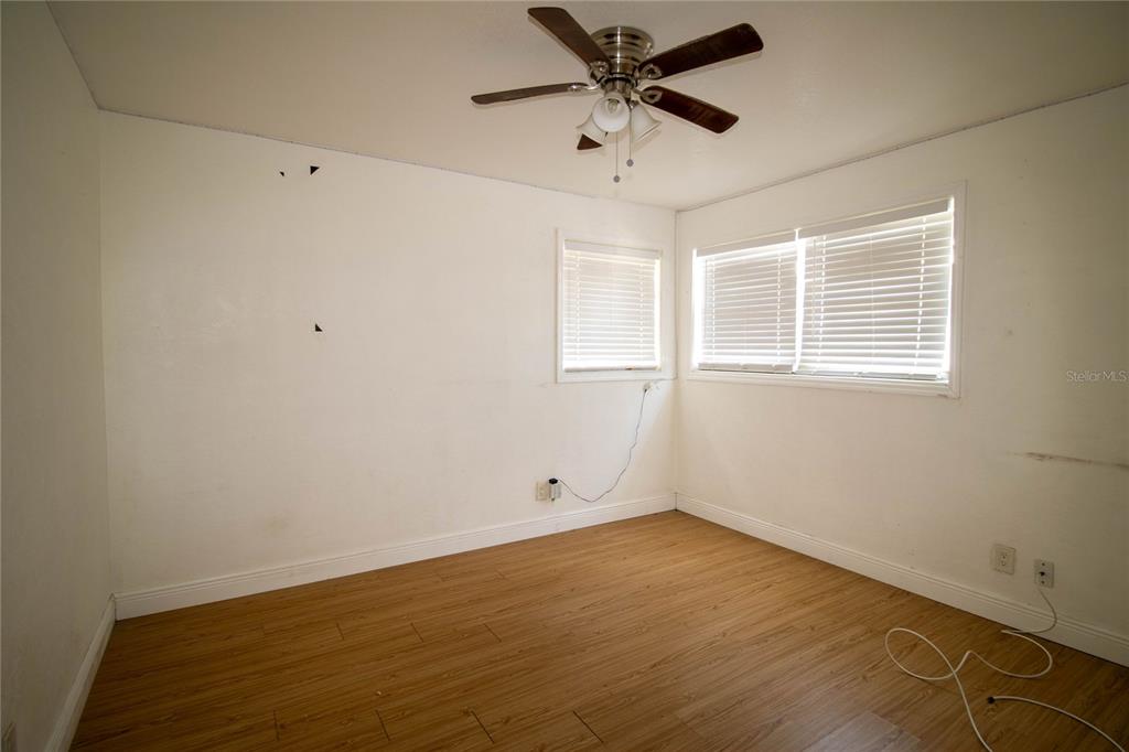 809 Maley Street Daytona Beach, FL 32114 - Photo 12 of 15 a view of an empty room with a window