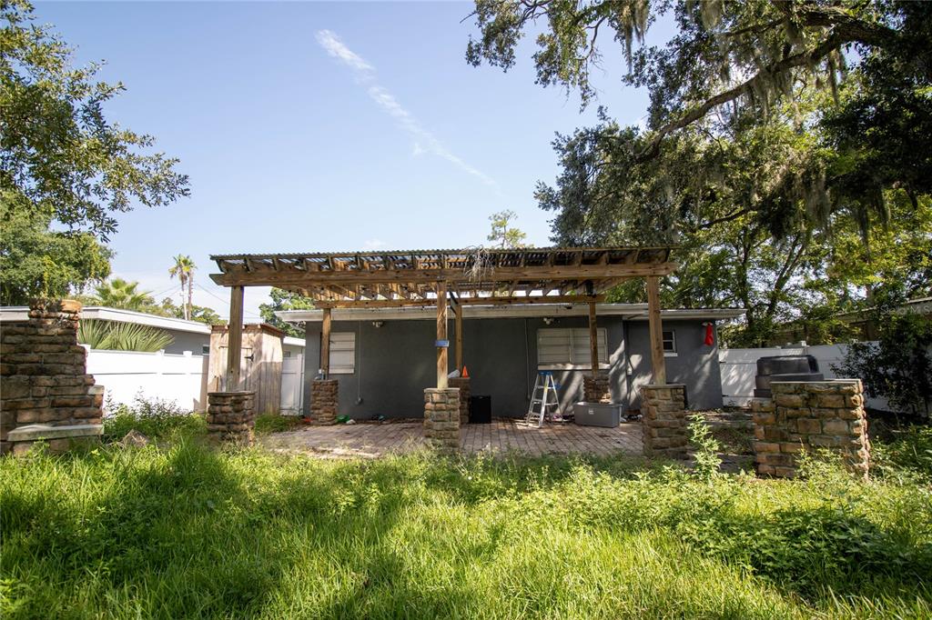 809 Maley Street Daytona Beach, FL 32114 - Photo 15 of 15 a front view of a house with a yard