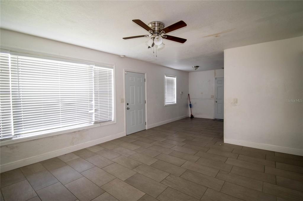 809 Maley Street Daytona Beach, FL 32114 - Photo 7 of 15 a view of an empty room with a window