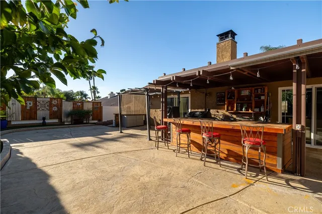 a view of a chairs and tables in the patio