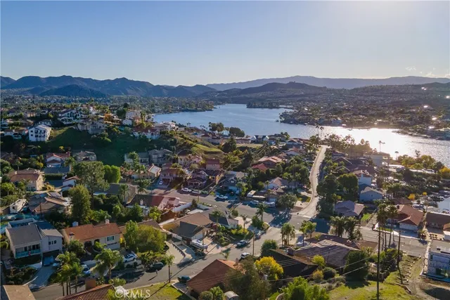 an aerial view of residential house and green space