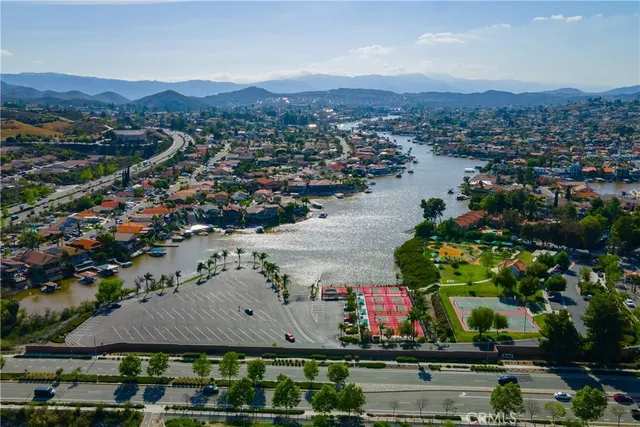 an aerial view of lake and residential houses