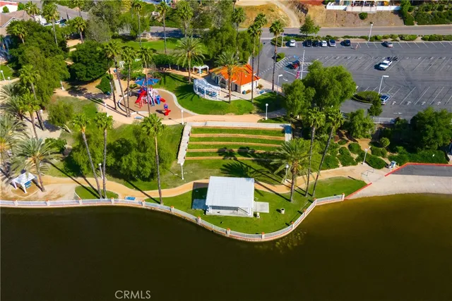 an aerial view of residential house with outdoor space and lake view