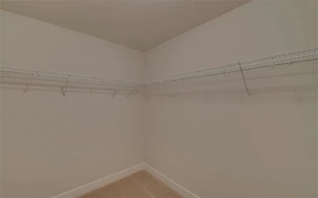 a view of a lake with a building in the background