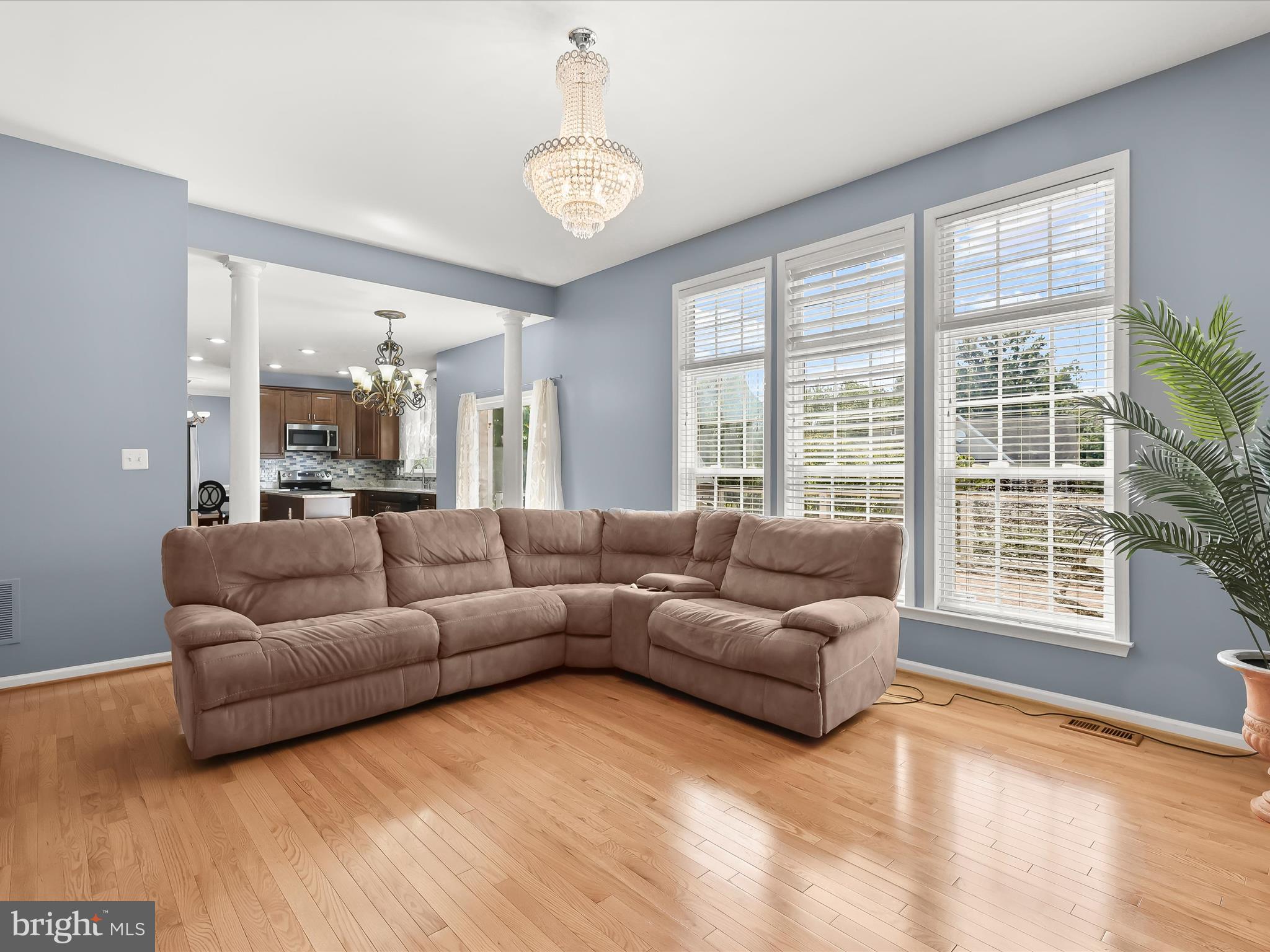 5816 Rockburn Woods Way Elkridge, MD 21075 - Photo 21 of 64 a living room with furniture and a large window