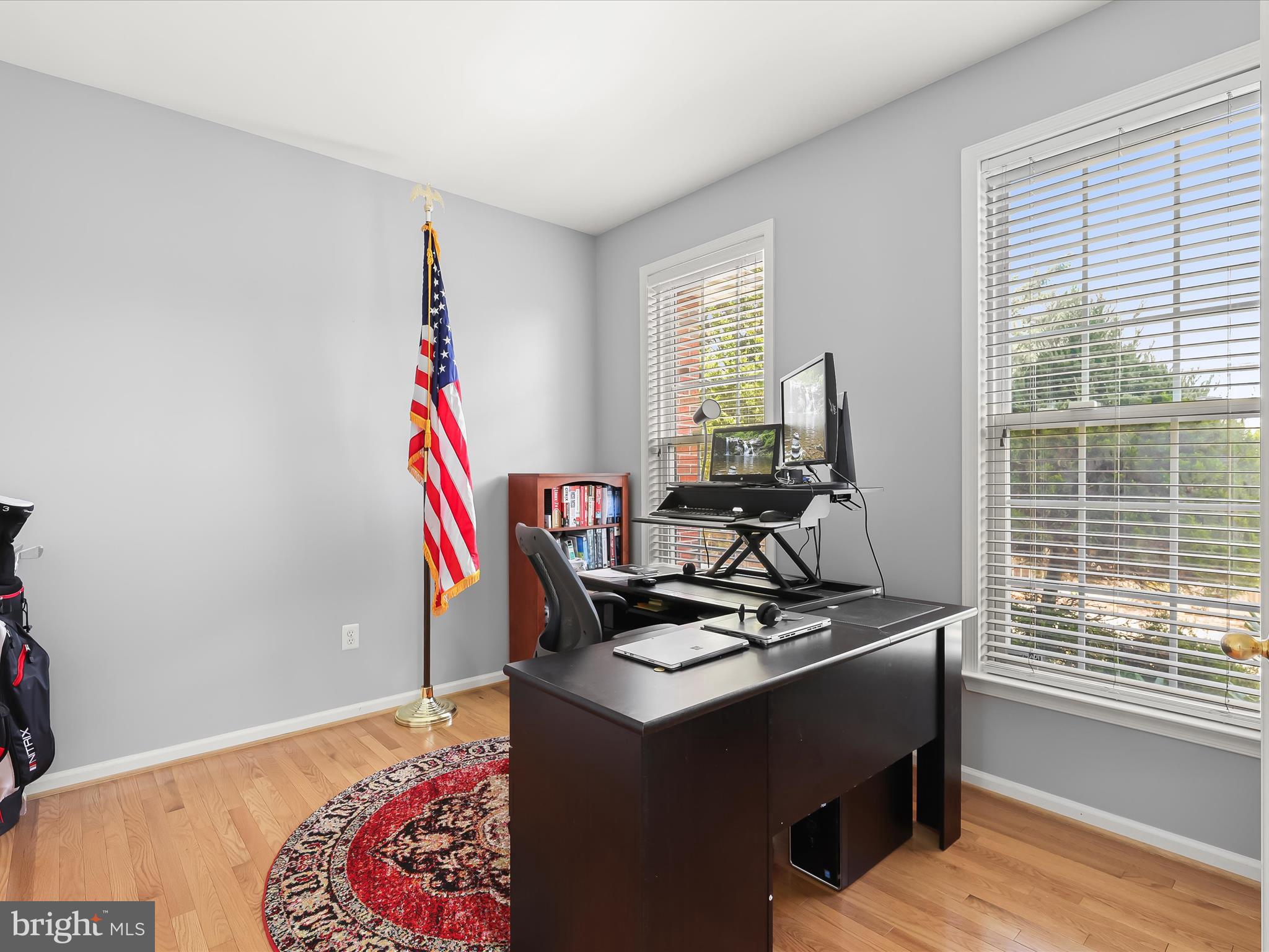 5816 Rockburn Woods Way Elkridge, MD 21075 - Photo 24 of 64 a room with furniture and a wooden floor