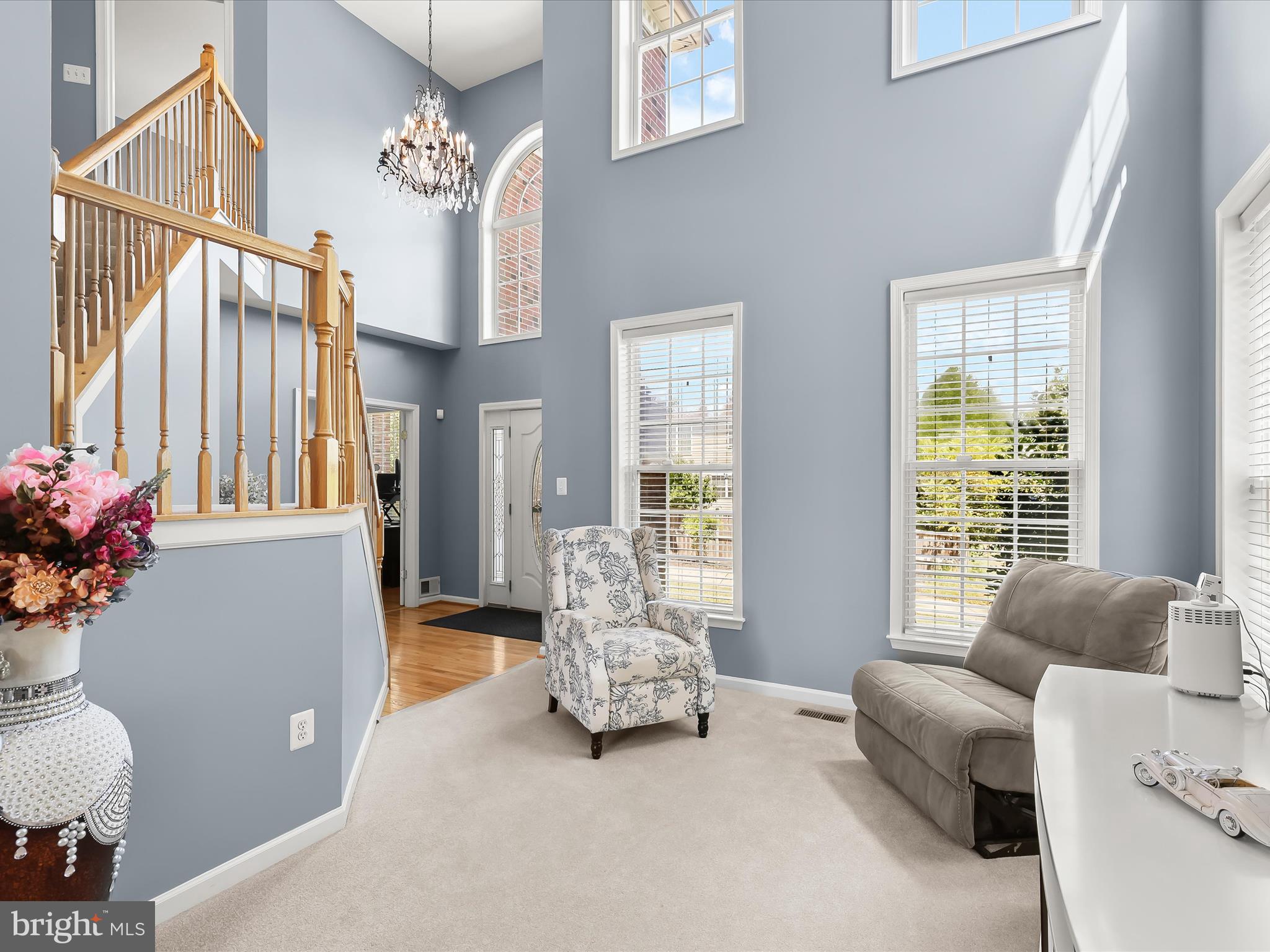 5816 Rockburn Woods Way Elkridge, MD 21075 - Photo 4 of 64 a living room with furniture and a large window
