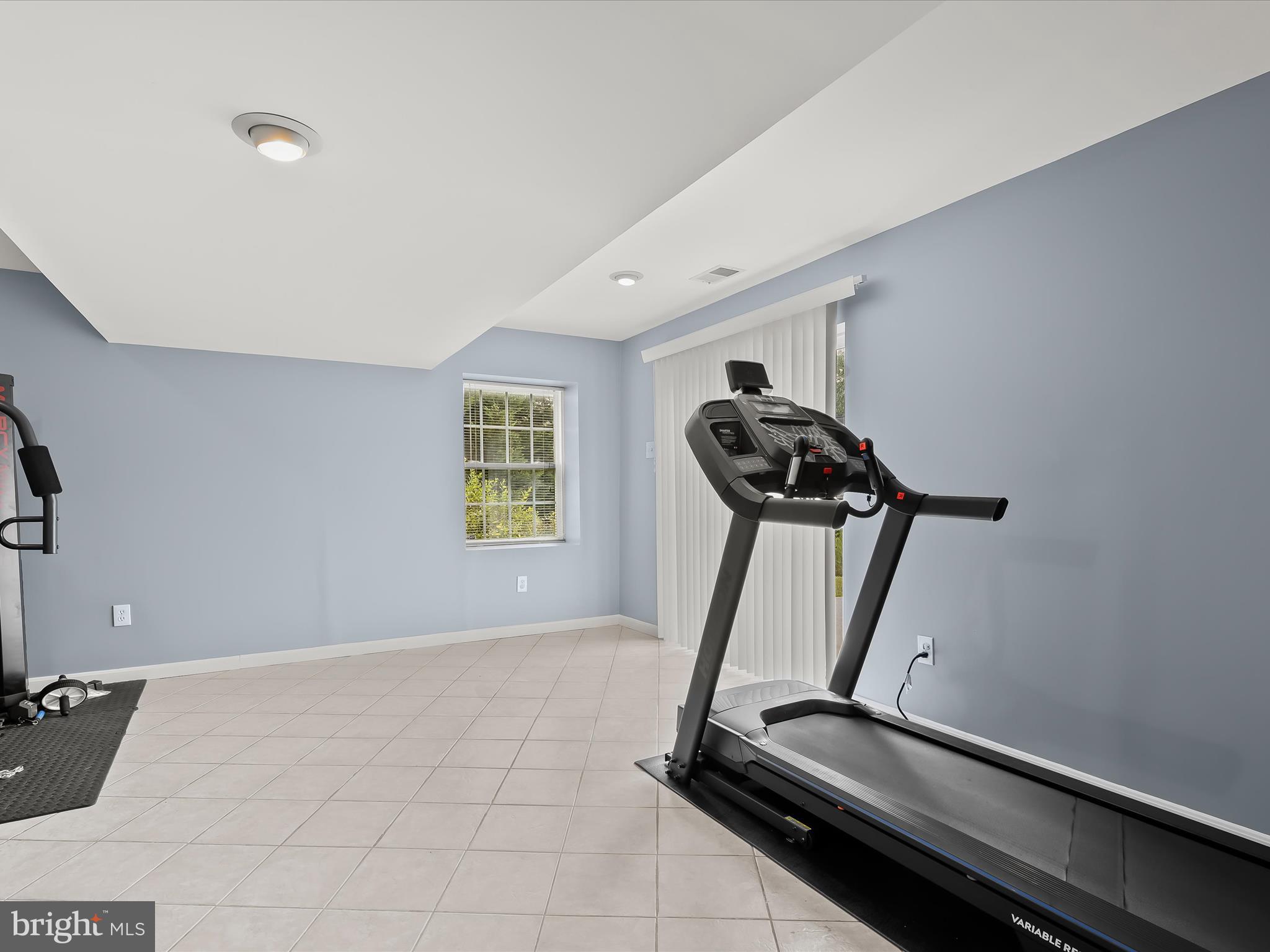 5816 Rockburn Woods Way Elkridge, MD 21075 - Photo 51 of 64 a room with gym equipment