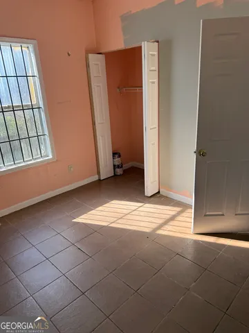 an empty room with windows