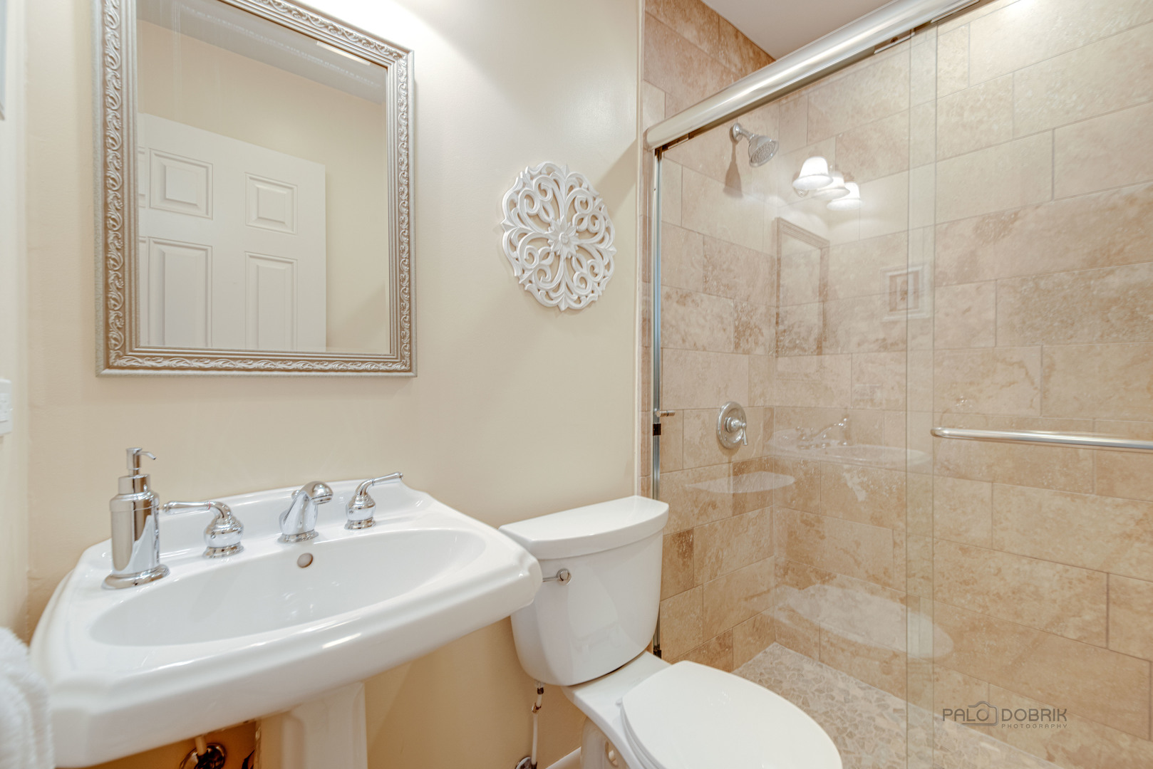 80 North Ridge Road Lake Forest, IL 60045 - Photo 16 of 36 a bathroom with a sink a toilet and shower