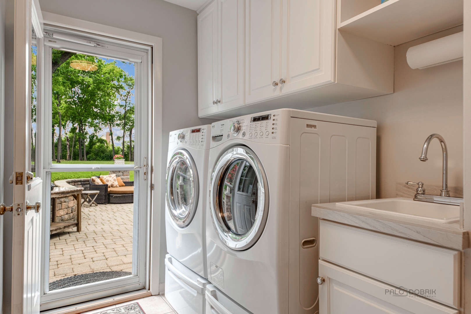80 North Ridge Road Lake Forest, IL 60045 - Photo 17 of 36 a utility room with dryer and washer