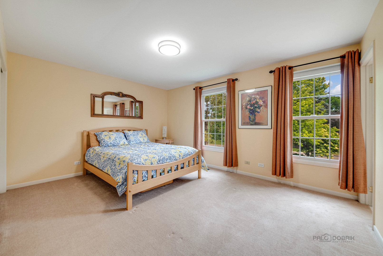 80 North Ridge Road Lake Forest, IL 60045 - Photo 25 of 36 a bedroom with a large bed and a window