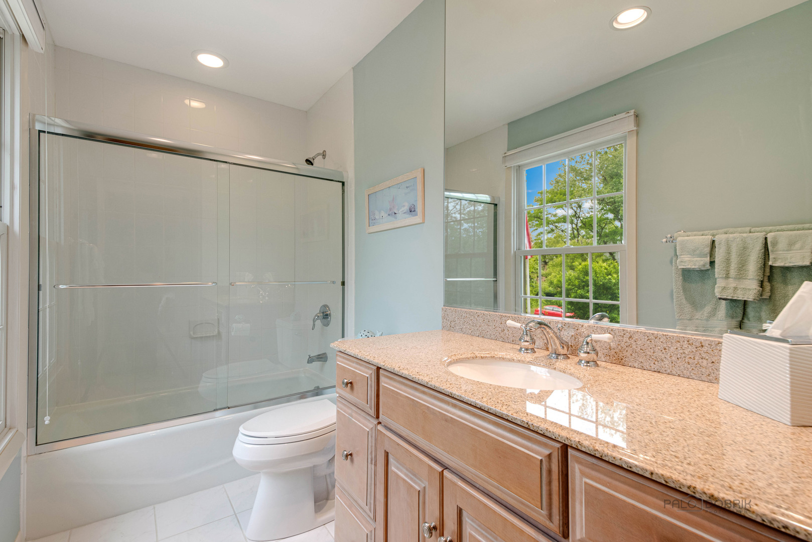 80 North Ridge Road Lake Forest, IL 60045 - Photo 26 of 36 a bathroom with a granite countertop sink a toilet and shower