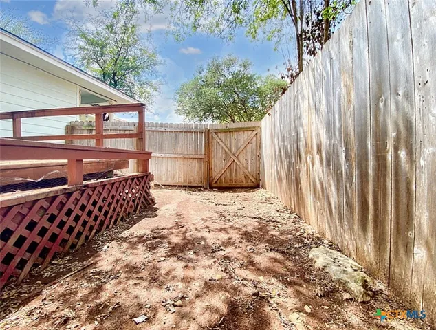a outdoor space with wooden fence