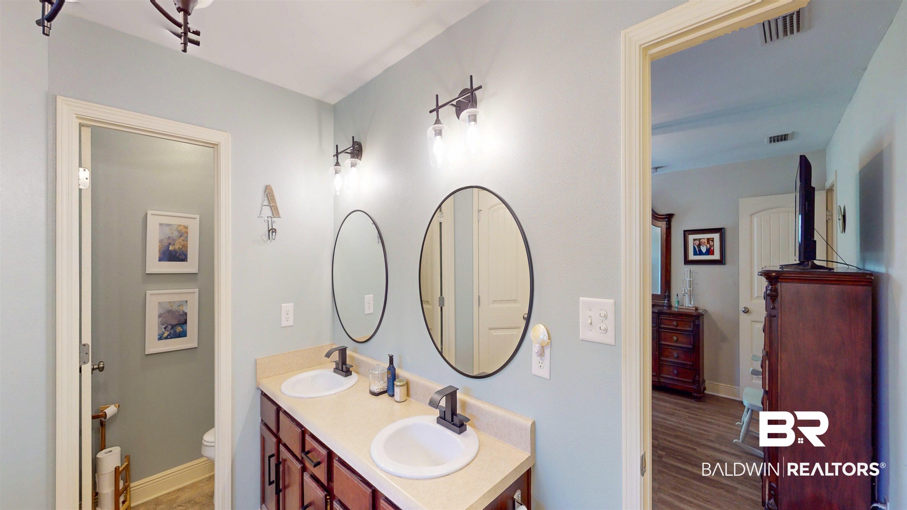 1304 Majesty Loop Foley, AL 36535 - Photo 15 of 44 Full bathroom with double vanity and light wood finished floors