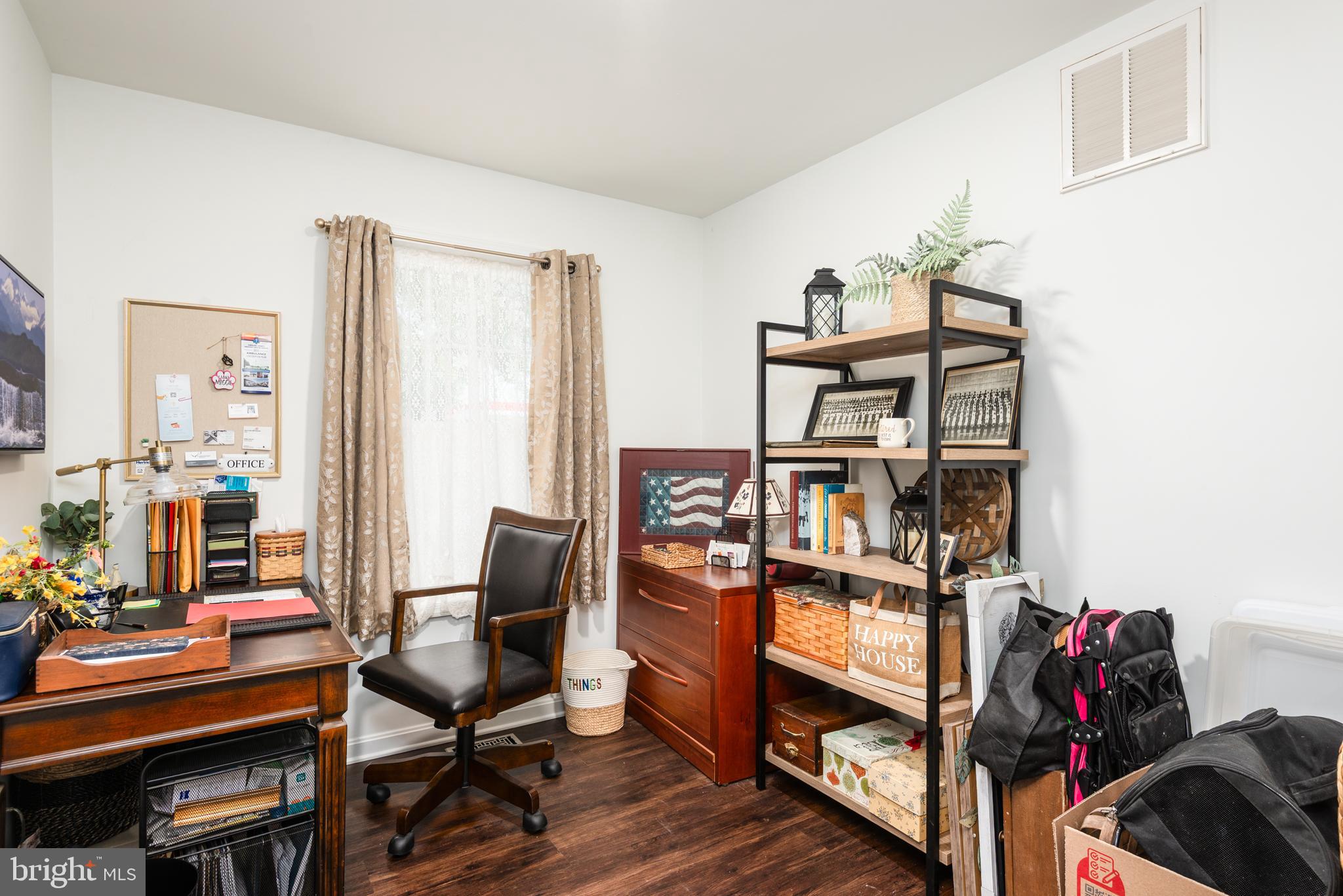 505 Maryland Avenue Ridgely, MD 21660 - Photo 12 of 23 a view of a workspace with furniture and toys