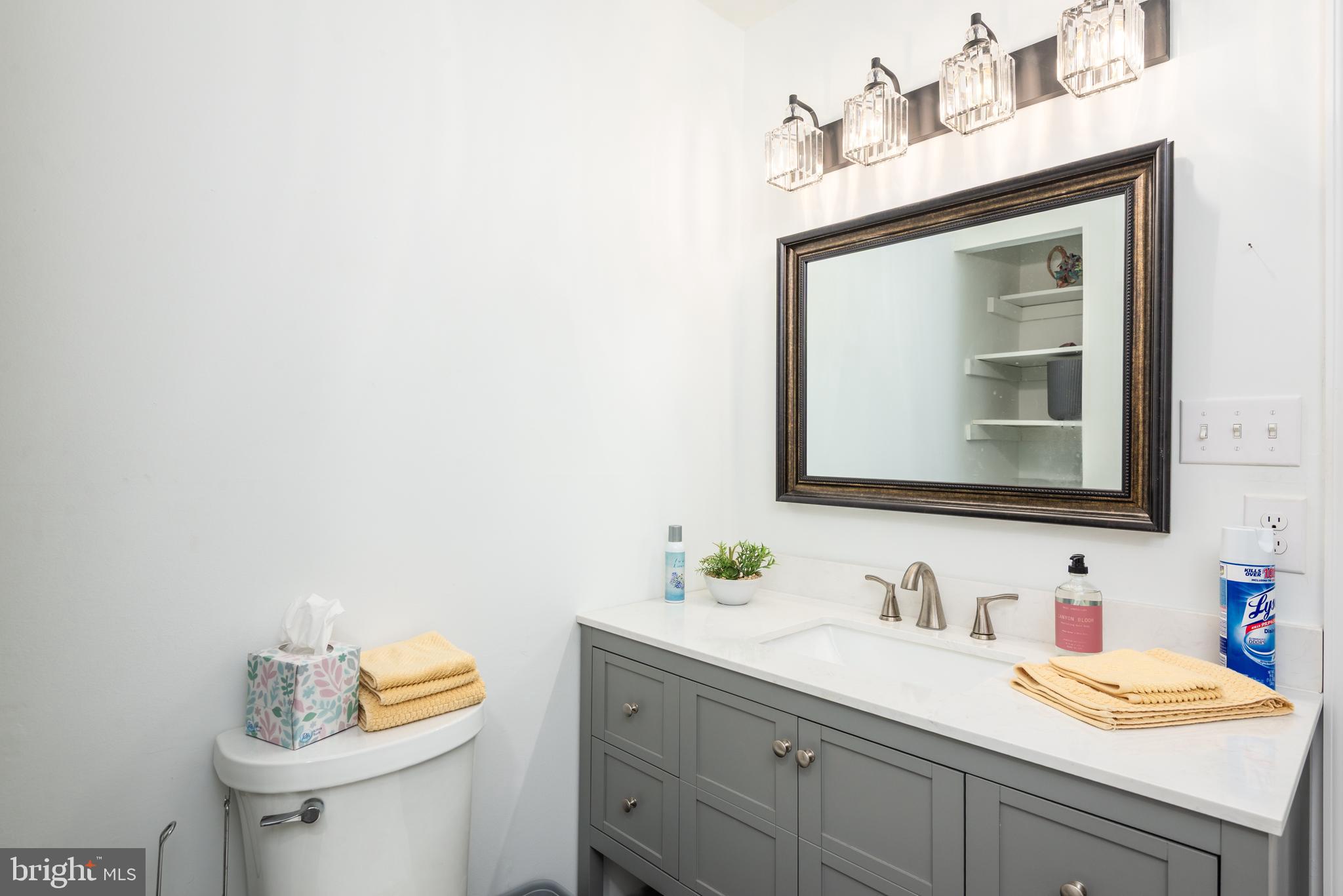 505 Maryland Avenue Ridgely, MD 21660 - Photo 18 of 23 a bathroom with a sink and a mirror