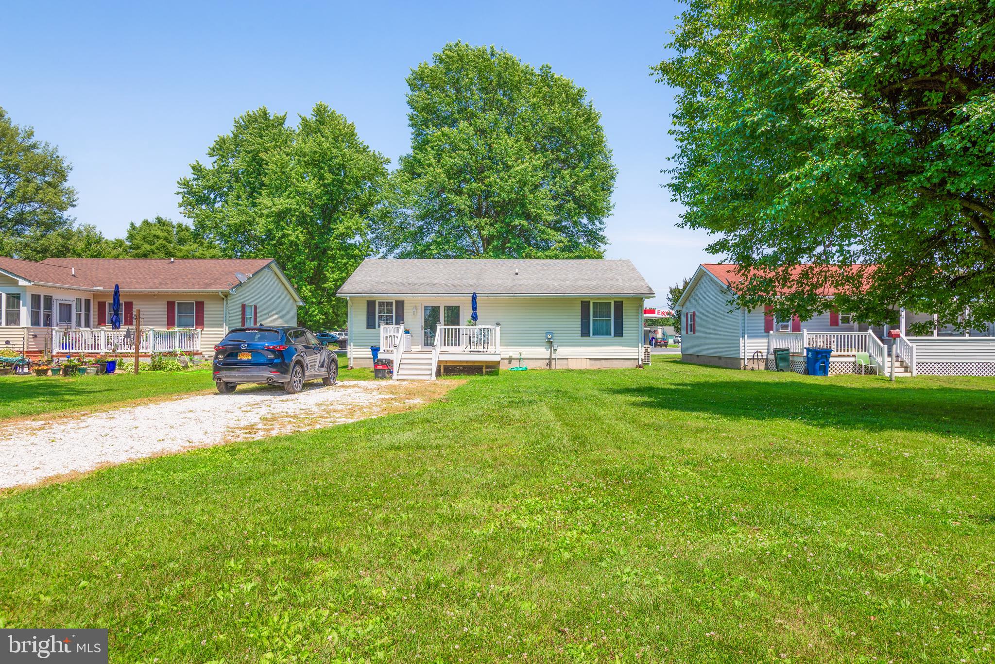 505 Maryland Avenue Ridgely, MD 21660 - Photo 2 of 23 a swimming pool view with a seating space and a garden view