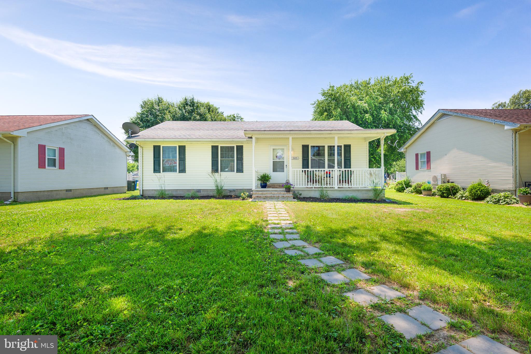 505 Maryland Avenue Ridgely, MD 21660 - Photo 22 of 23 a front view of house with yard and outdoor seating