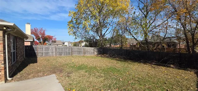 a house view with a outdoor space