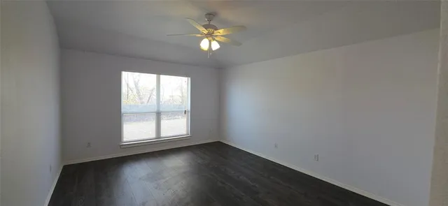 a view of an empty room and window