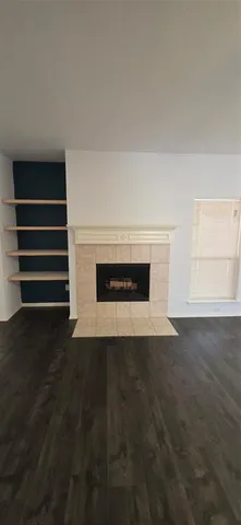 a kitchen with kitchen island a sink stove and refrigerator