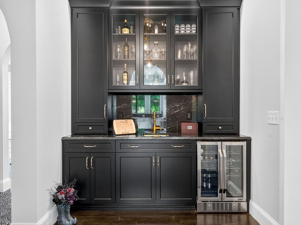 18 Keeney Pond Road Norfolk, MA 02056 - Photo 11 of 42 a kitchen with a sink and cabinets