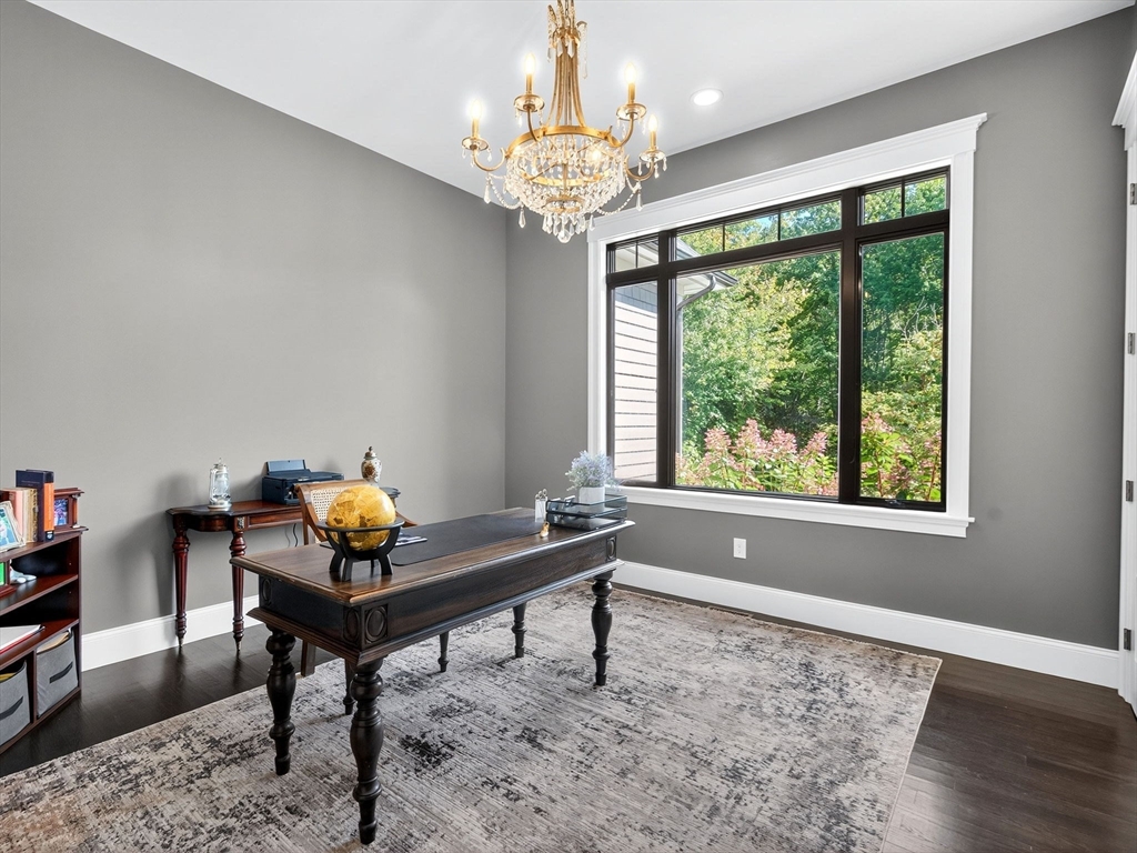 18 Keeney Pond Road Norfolk, MA 02056 - Photo 15 of 42 a room with furniture and a window