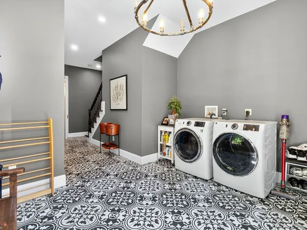 a utility room with dryer and washer