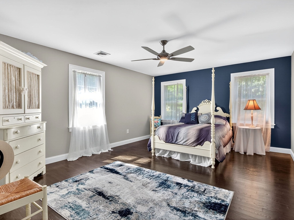 18 Keeney Pond Road Norfolk, MA 02056 - Photo 19 of 42 a living room with furniture and wooden floor