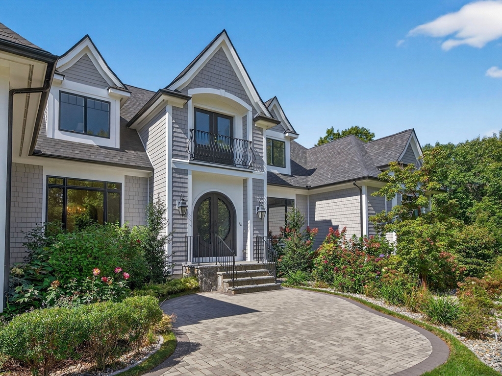 18 Keeney Pond Road Norfolk, MA 02056 - Photo 2 of 42 a front view of a house with a yard