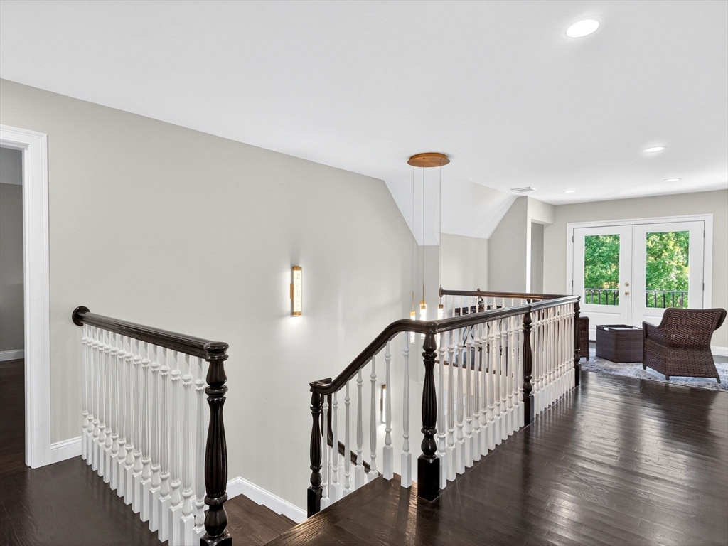 18 Keeney Pond Road Norfolk, MA 02056 - Photo 28 of 42 a view of entryway with wooden floor and stairs