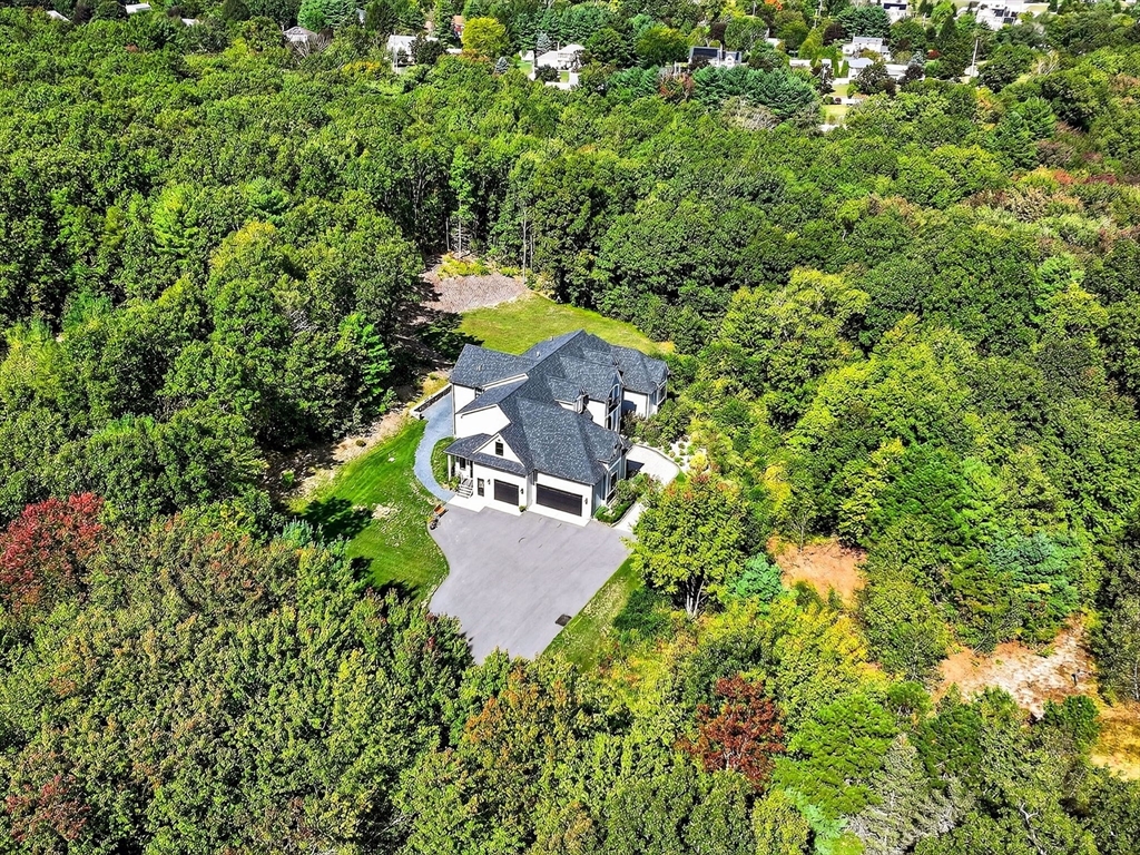 18 Keeney Pond Road Norfolk, MA 02056 - Photo 38 of 42 an aerial view of a house with a yard