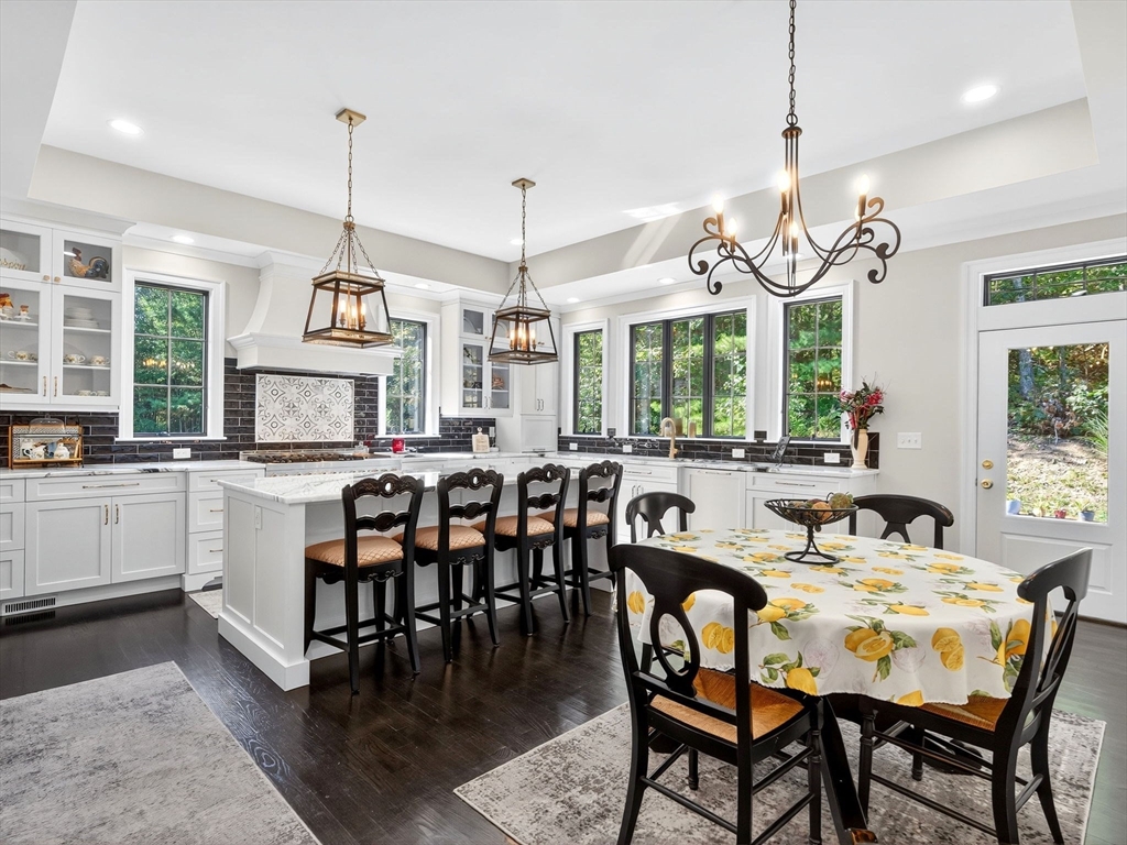 18 Keeney Pond Road Norfolk, MA 02056 - Photo 6 of 42 a view of a dining room with furniture window and wooden floor