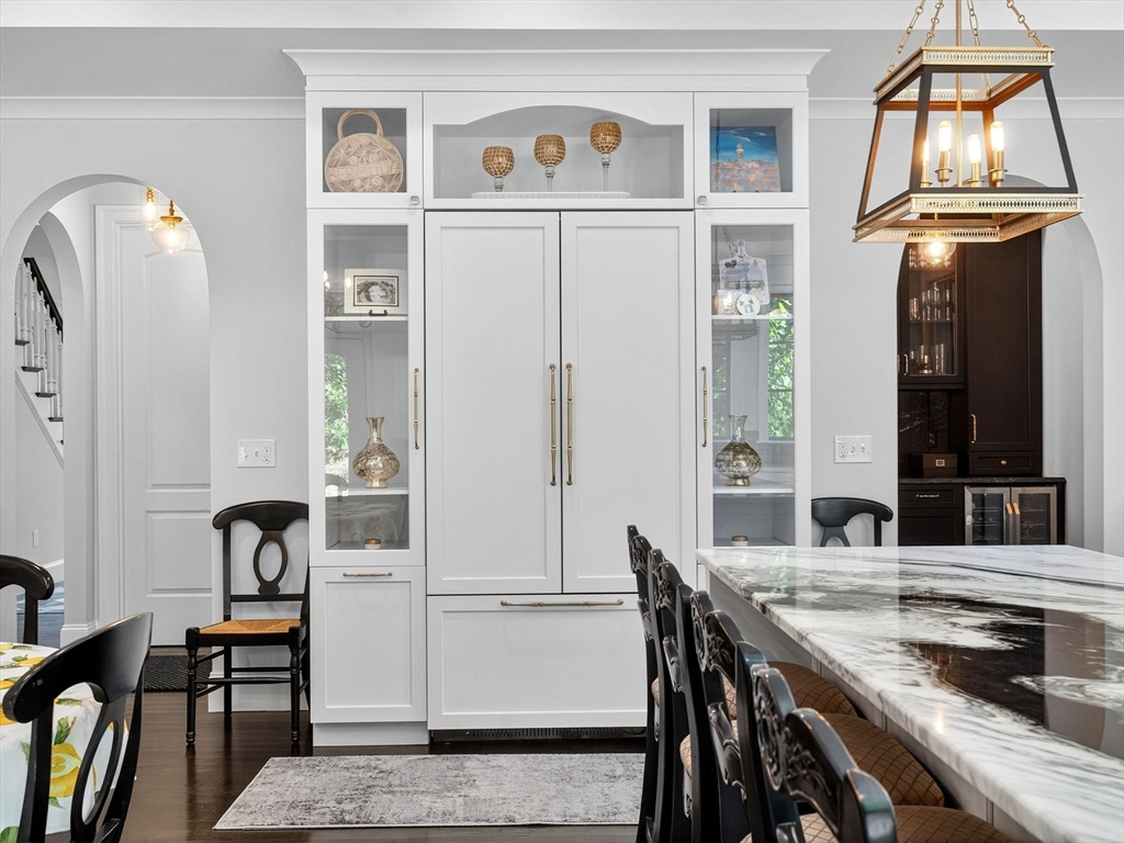 18 Keeney Pond Road Norfolk, MA 02056 - Photo 10 of 42 a view of a dining room with furniture and a window